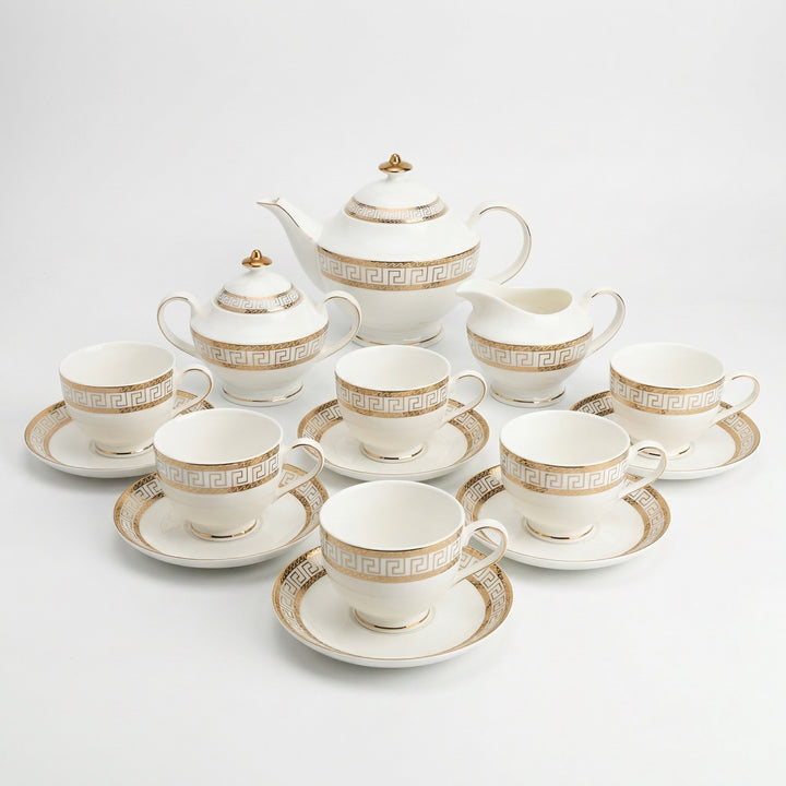 Heritage Gold fine bone china tea set with geometric border and 22k gold detailing on a white background