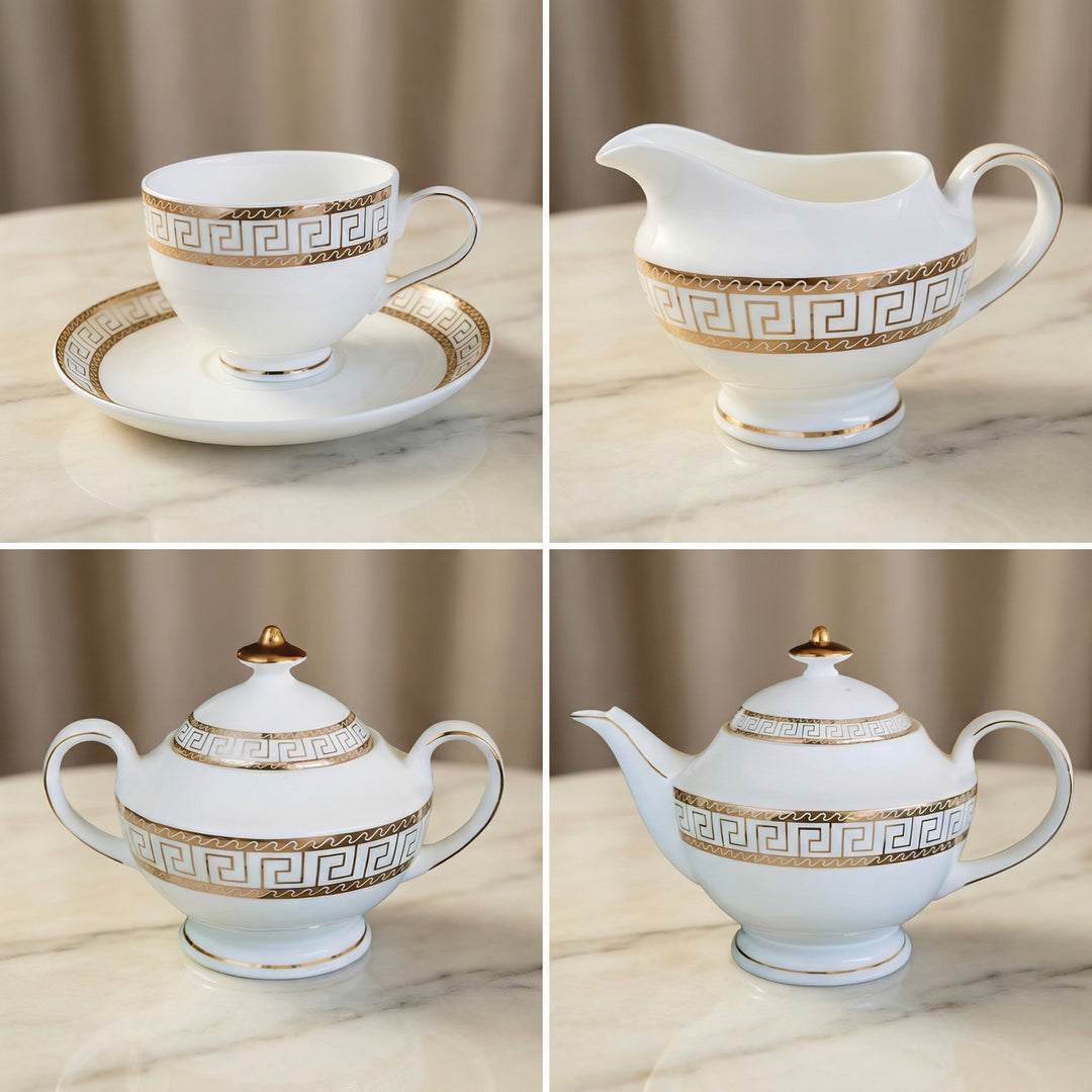 Heritage Gold tea set close-up showing teacup and saucer, milk jug, sugar bowl and teapot with 22k gold detailing