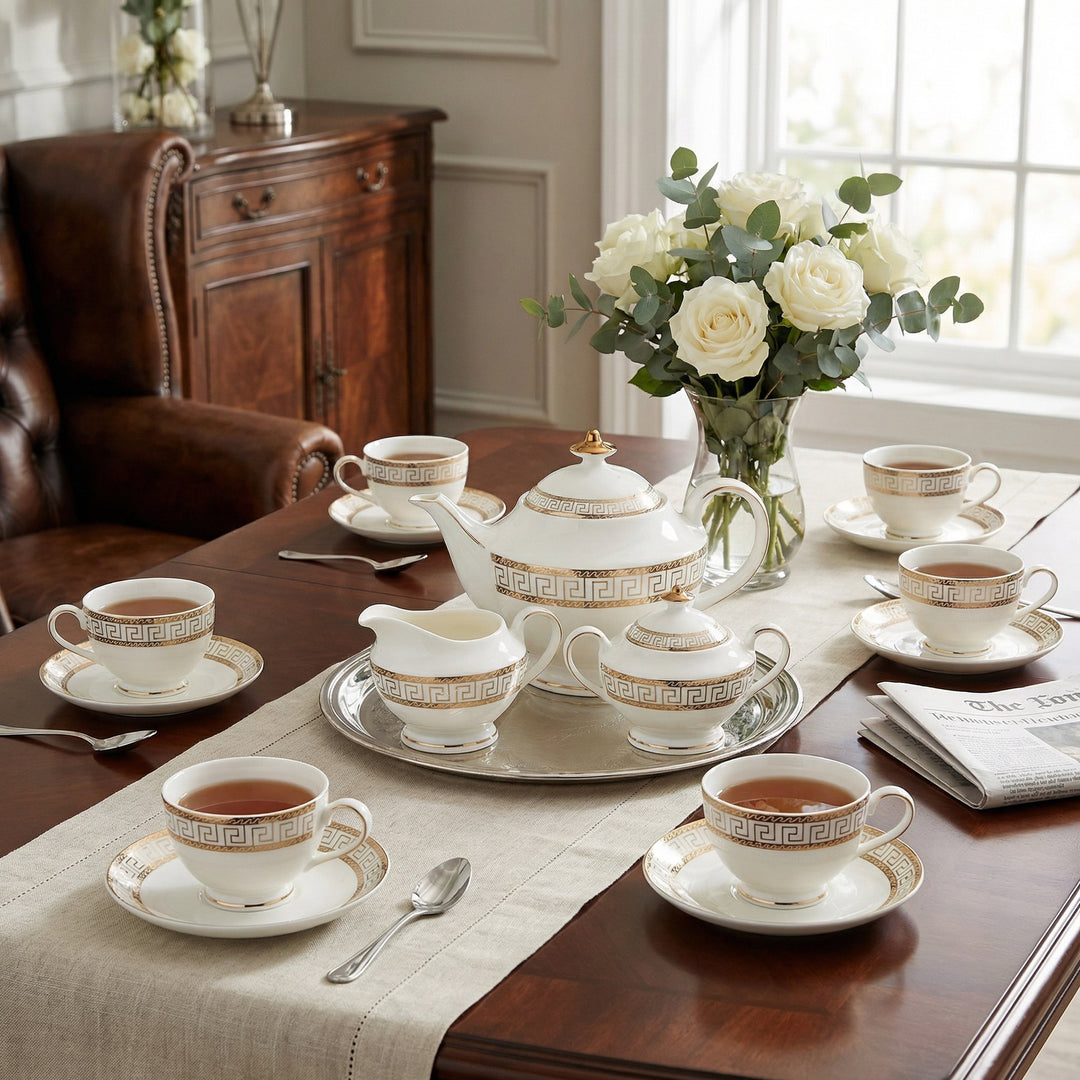 Heritage Gold fine bone china tea set with geometric border and 22k gold detailing set on a dining table