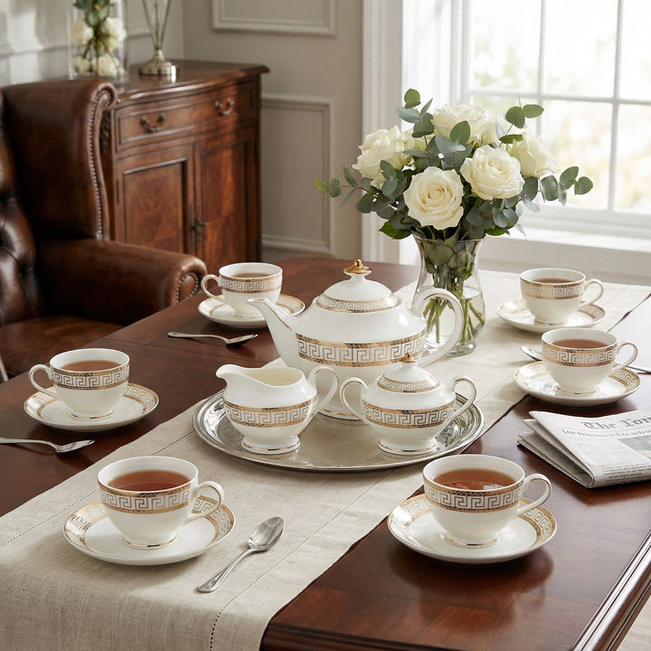 Heritage Gold fine bone china tea set with geometric border and 22k gold detailing set on a dining table
