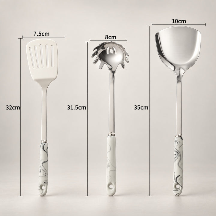 Three stainless steel kitchen utensils with grey marbled pattern handles are shown on a light grey background, each with its width and total length labelled in centimetres: a spatula at 7.5cm wide by 32cm long, a spaghetti server at 8cm wide by 31.