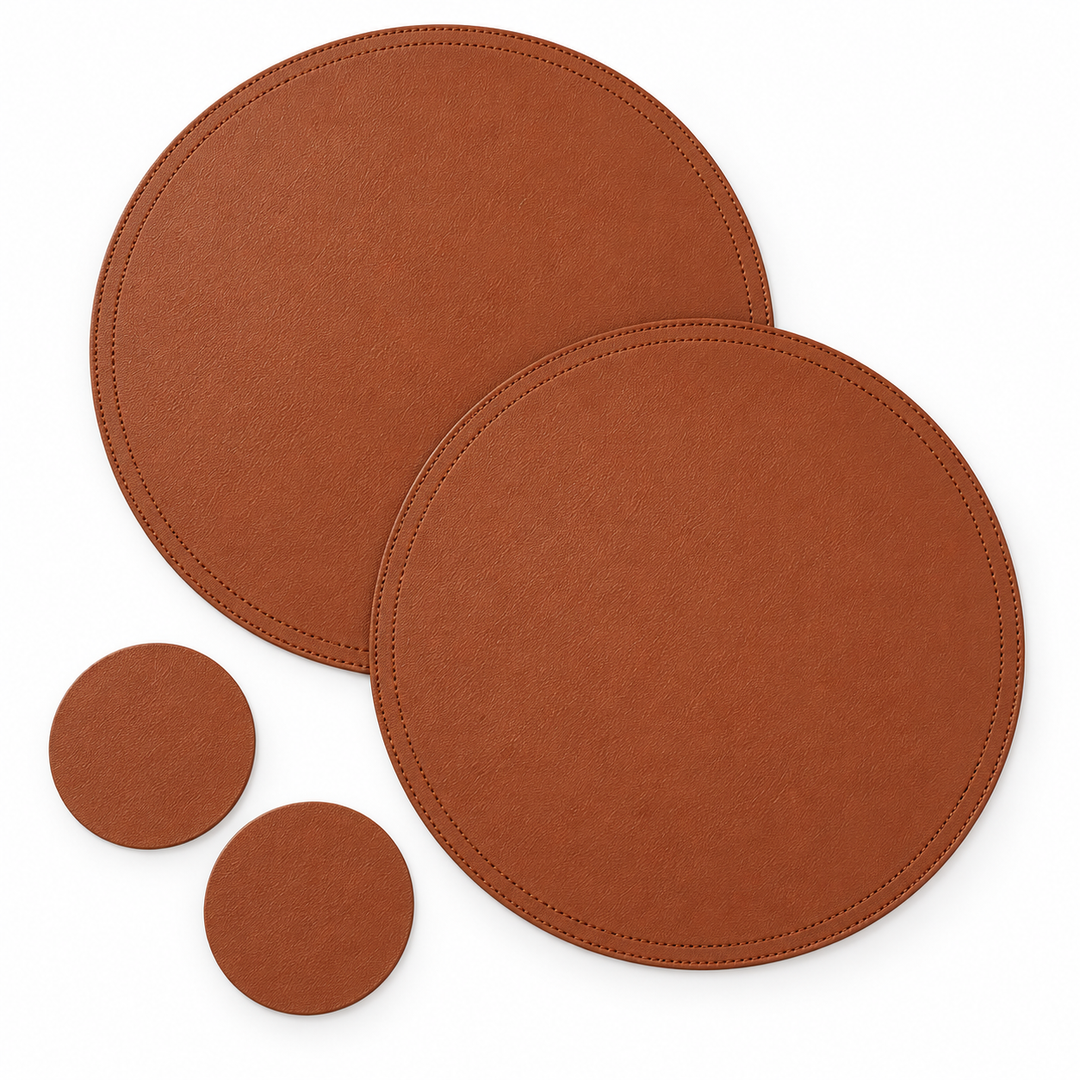 Two round brown faux-leather placemats and two round matching coasters, arranged on a clean white background.
