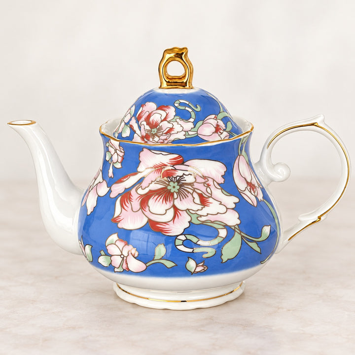 Rosewood Garden blue floral teapot with pink and ivory flowers, gold detailing and a white handle