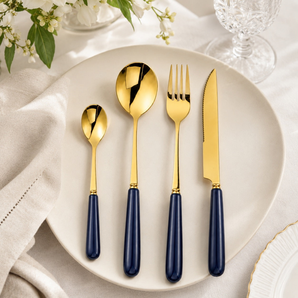 Aldermere Midnight Navy and gold four-piece place setting with neutral dinnerware
