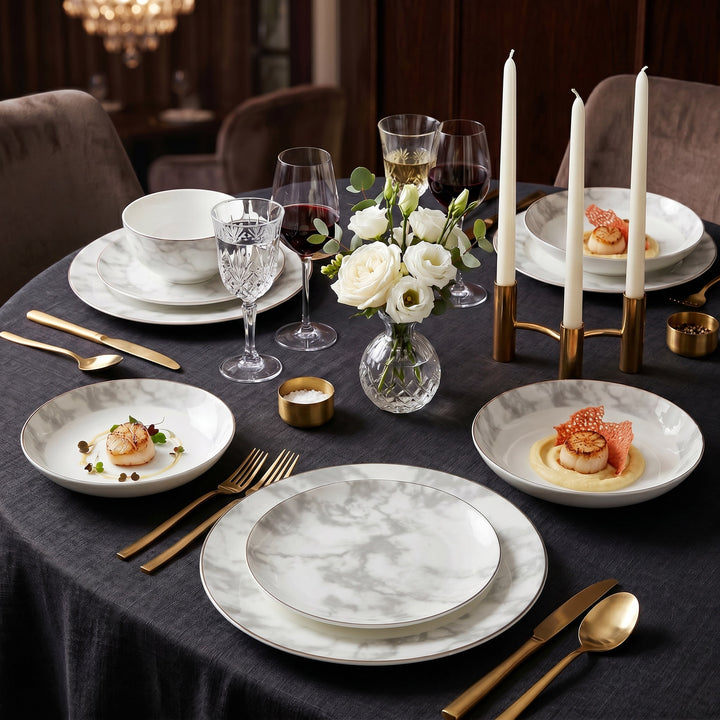 Aurelia fine bone china dinner set styled on an elegant dining table with gold cutlery and glassware