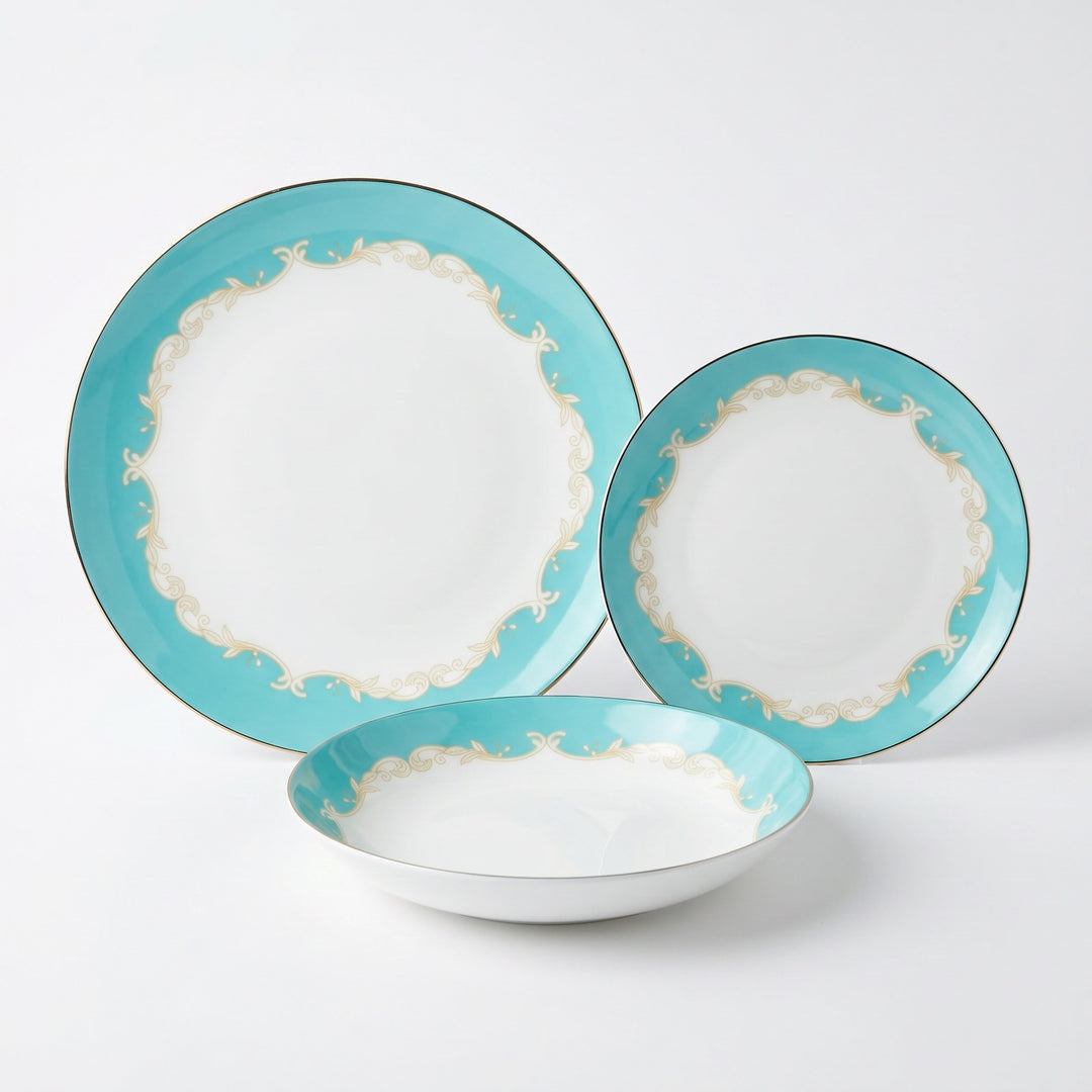 Belmont 12-piece fine bone china dinner set with soft aqua border and hand-painted gold edge
