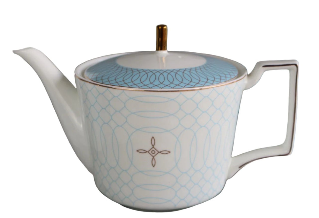  Light blue and white teapot with gold accents, part of a bone china tea set.