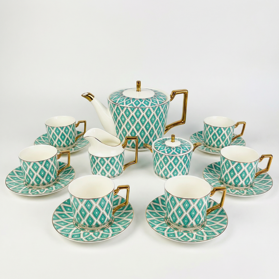 The Edwardian Emerald Diamant bone china tea set for six with teapot, milk jug, sugar bowl, six teacups and six saucers, finished with gold-tone detailing.