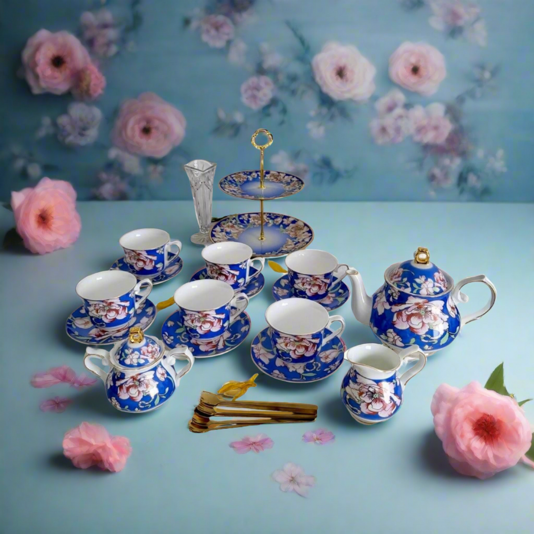 Warwickshire Royal Bone China Tea Set arranged with a 2-Tier Cake Stand and Pink Flowers in the Background