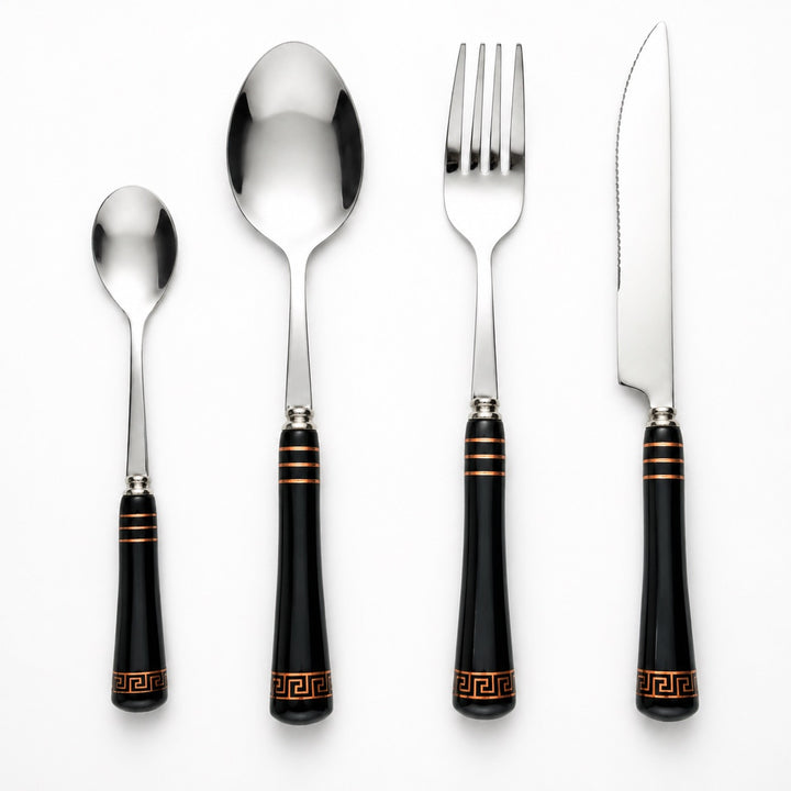 Heritage Gold black four-piece cutlery setting with ceramic handles and gold detailing