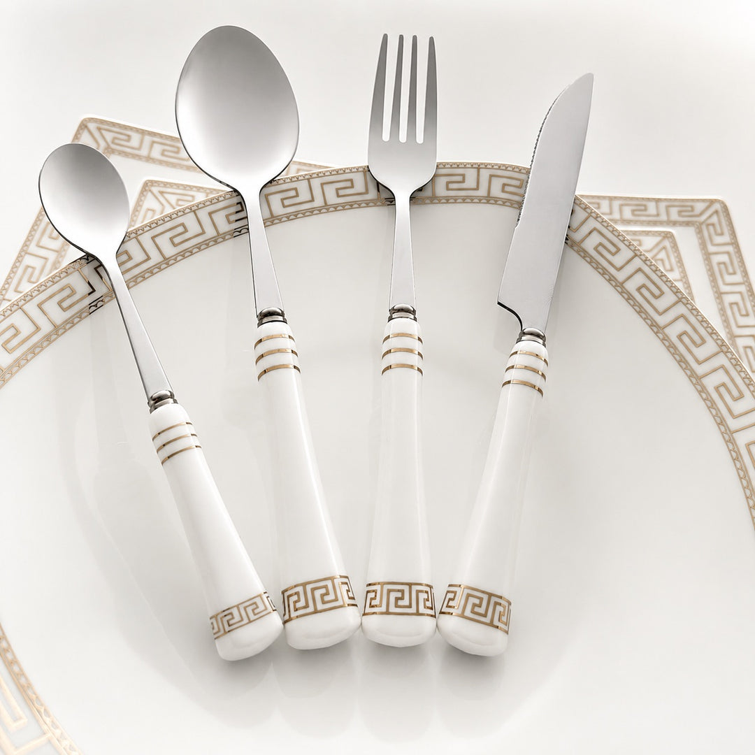 Heritage Gold cutlery styled with coordinating white and gold dinnerware