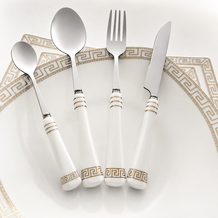 Heritage Gold cutlery styled with coordinating white and gold dinnerware