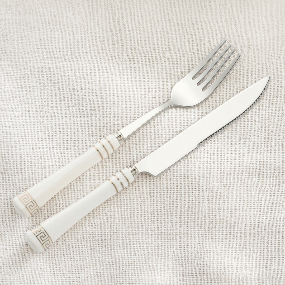 Heritage Gold table fork and knife with white ceramic handles