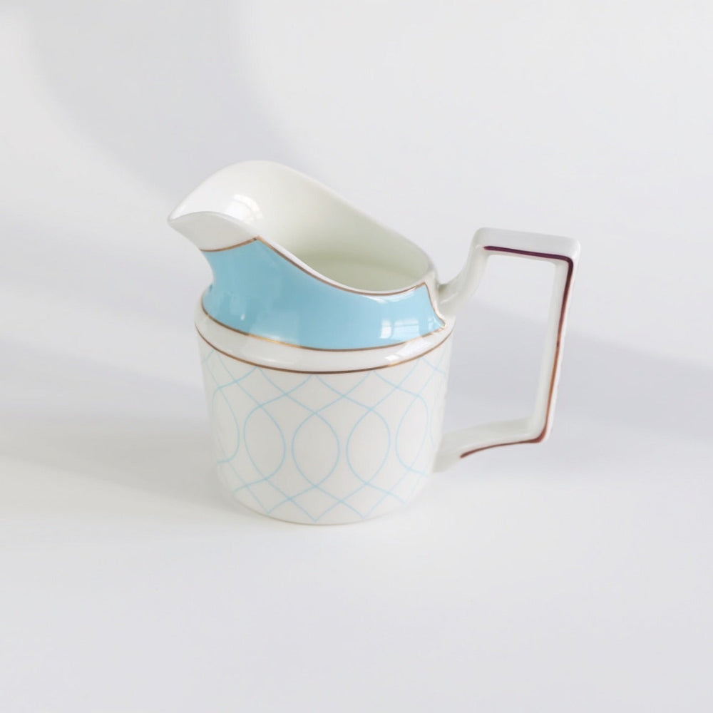 Regent Blue Gold fine bone china milk jug with blue and white pattern and gold handle