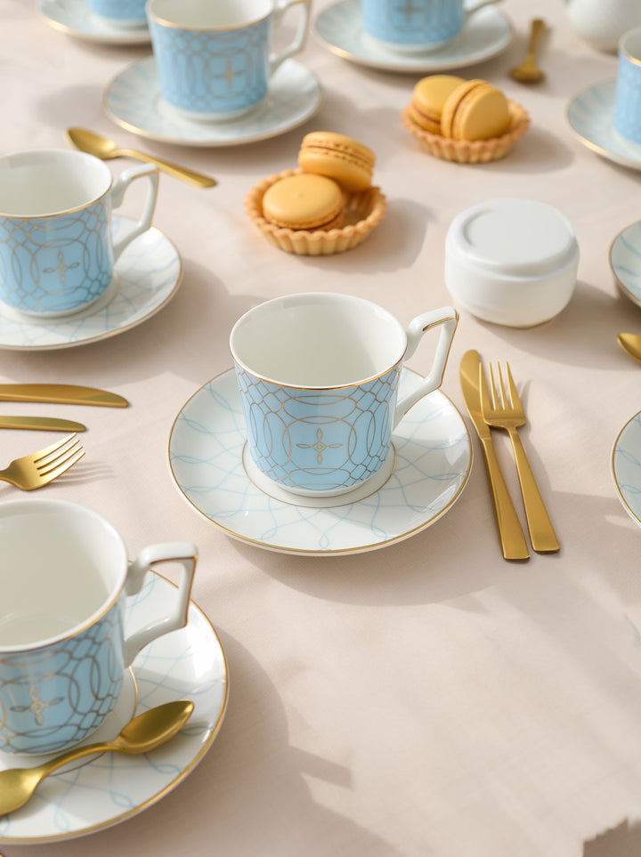 Regent Blue Gold fine bone china teacups and saucers arranged for afternoon tea