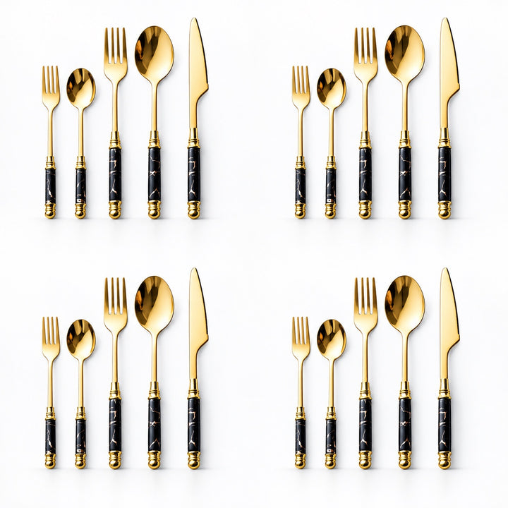 Four identical sets of gold flatware with black marble-patterned handles, arranged in a 2x2 grid on a white background. Each set includes a fork, spoon, knife, and dinner spoon.